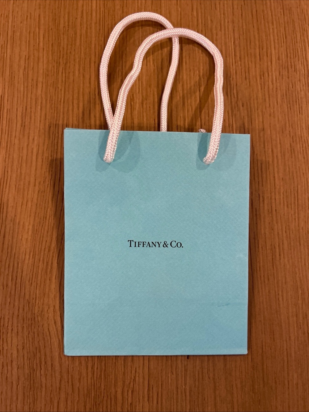 Tiffany & Co. Mini Shopping Bag 
6" x 5" x 3"